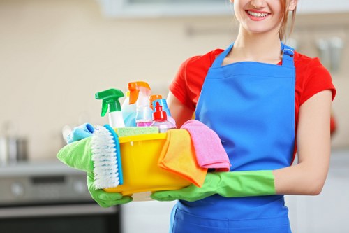 Professional oven cleaner in Westminster deep cleaning a kitchen oven